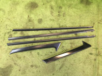 Молдинг бокового стекла левый 91012AC000 91013AC000 91011AC100 SUBARU LEGACY