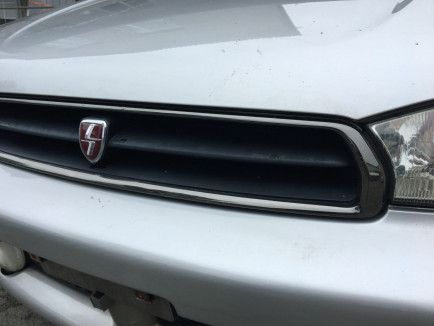 Решетка радиатора 91061AC200 SUBARU LEGACY