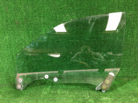 Стекло передней левой двери 61011AE030 SUBARU LEGACY B4