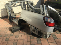 左リアフェンダー SUBARU LANCASTER OEM 51410AE170 BH9 BHE 2001 grey 1U2