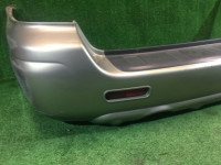 Бампер задний SUBARU LANCASTER OEM 57703AE080MF, 57711AE040 BHE BH9 1999 white / grey 8K2