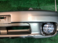 Para-choques dianteiro SUBARU LANCASTER OEM 57703AE130MF, 57704AE020 BH9 1998 beige 8L5