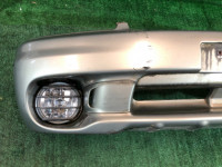 Para-choques dianteiro SUBARU LANCASTER OEM 57703AE130MF, 57704AE020 BH9 1998 beige 8L5