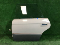 Дверь задняя левая 60400AE130 60400AE250 SUBARU LANCASTER