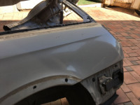 Aleta trasera izquierda SUBARU LANCASTER OEM 51410AE150 BH9 1998 beige 8L5