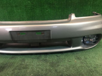 Parachoques delantero SUBARU LANCASTER OEM 57703AE130MF, 57711AE060, 84501AE040, 84501AE050 BH9 BHE 1998 beige 8L5