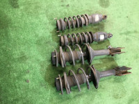 Стойки SUBARU LANCASTER OEM 20310AE150, 20310AE140, 20330AE100, 20365AE021 BHE BH9 2000 EJ254 AT