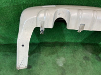 Parachoques trasero SUBARU LANCASTER OEM 57703AE080YF BH9 2001 White 07C