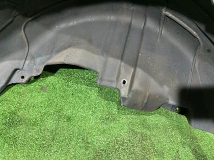 Подкрылок задний левый