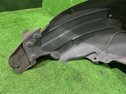 Подкрылок задний левый