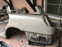 Guarda-lamas traseiro esquerdo SUBARU LANCASTER OEM 51410AE170 BH9 1998 Beige 8L5
