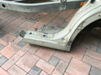 Guarda-lamas traseiro esquerdo SUBARU LANCASTER OEM 51410AE170 BH9 1998 Beige 8L5