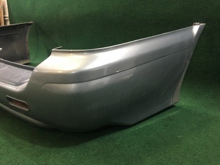 Бампер задний SUBARU LANCASTER OEM 57703AE080LG XX57703AE080 BHE 2000 white / grey 0U4