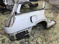 Guarda-lamas traseiro direito SUBARU LANCASTER OEM 51410AE160 BHE 2000 white / grey 0U4