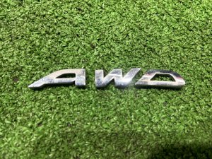 Эмблема symmetrical awd 91572SC000 SUBARU FORESTER