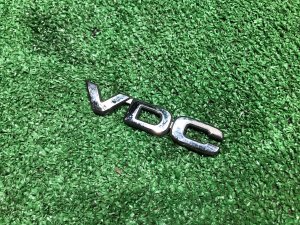 Эмблема VDC SUBARU LANCASTER OEM 93073AE690 BHE 2002 SILVER/GREY 1U2