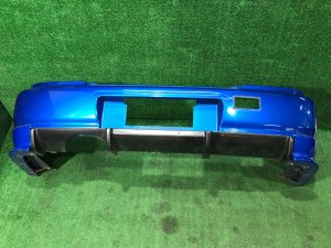 Бампер задний с клыками 57703FE050PG SUBARU IMPREZA