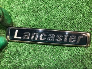 Эмблема LANCASTER SUBARU LANCASTER OEM 93073AE410 BH9 1999 BEIGE 8L5