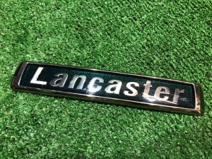 Эмблема LANCASTER SUBARU LANCASTER OEM 93073AE410 BH9 1999 BEIGE 8L5